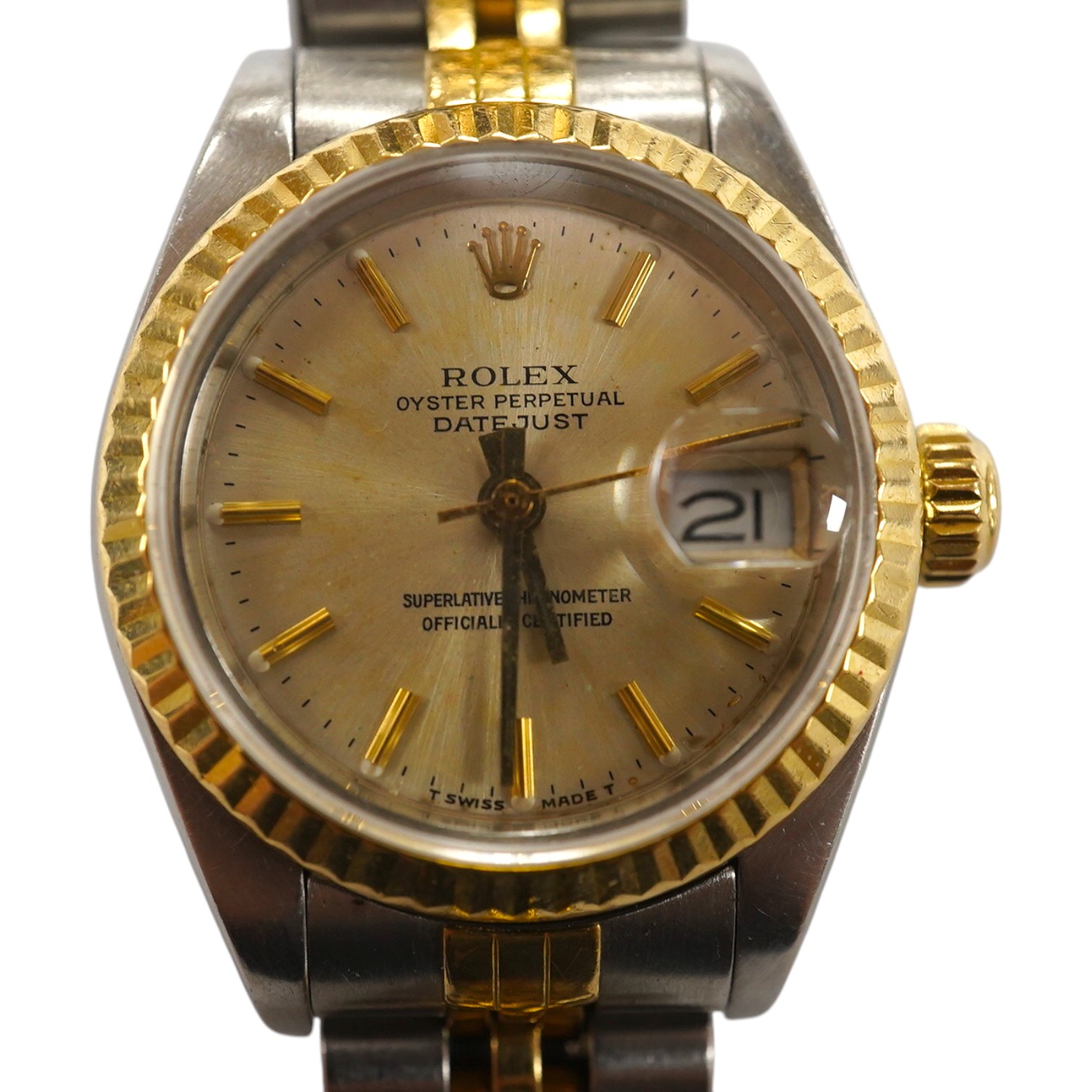 A lady's late 1980's steel and gold Rolex Oyster Perpetual Datejust wrist watch, with baton numerals, serial no. 9773085, on a steel and gold Rolex bracelet, no box or papers. Condition - poor to fair